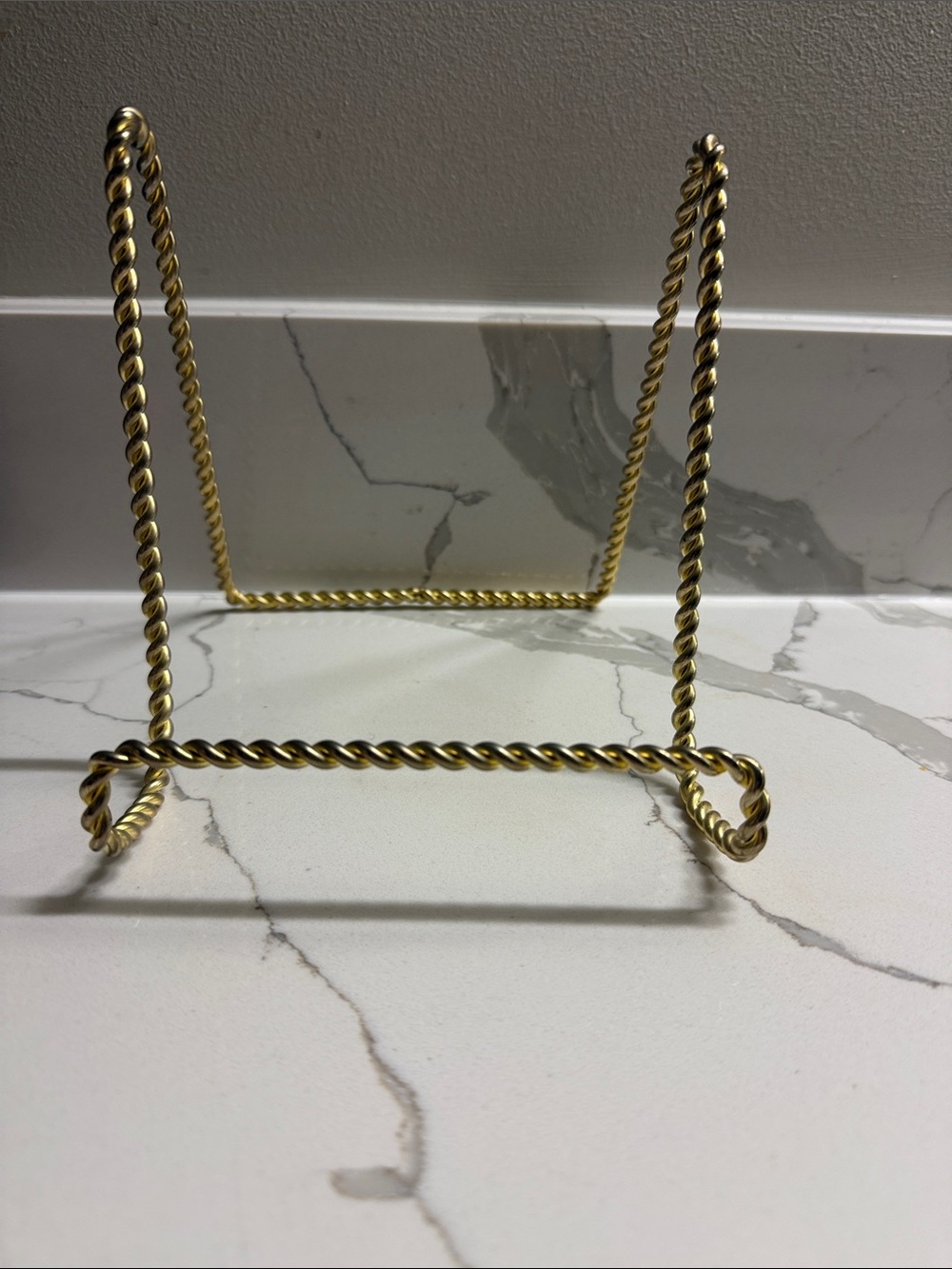 6”H gold tone metal display/easel
